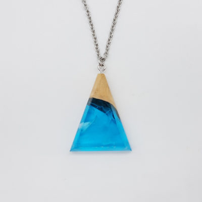 Resin necklace,  inverted triangle design in transparent blue with white waves and olive wood large