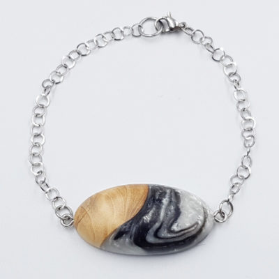 Resin bracelet in black and white with olive wood