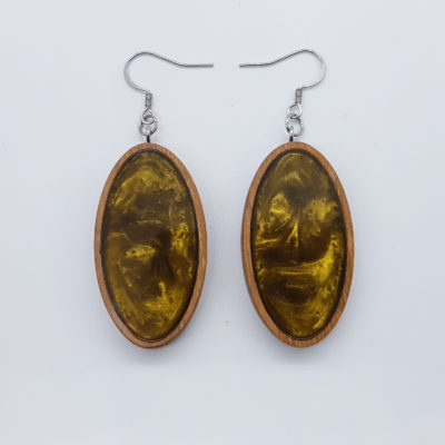 Resin earrings, oval in gold color with wooden bezel