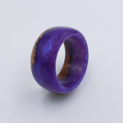 Resin ring in lilac color with wood