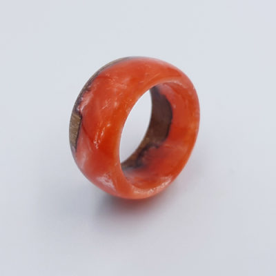 Resin ring in pink color with wood
