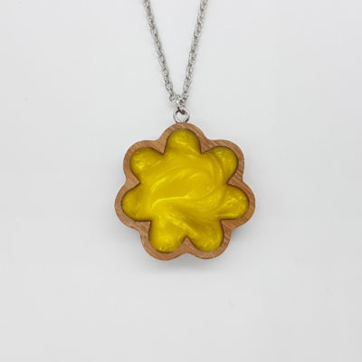Resin necklace small, flower design in yellow color with wooden bezel